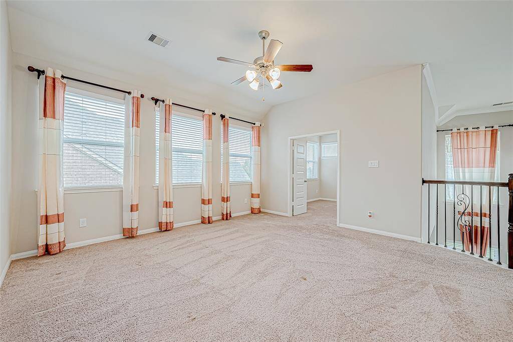 The common area or game room is a versatile space, perfect for family activities, entertaining guests, or relaxing. It offers plenty of room for games, a media center, or a cozy lounge area.