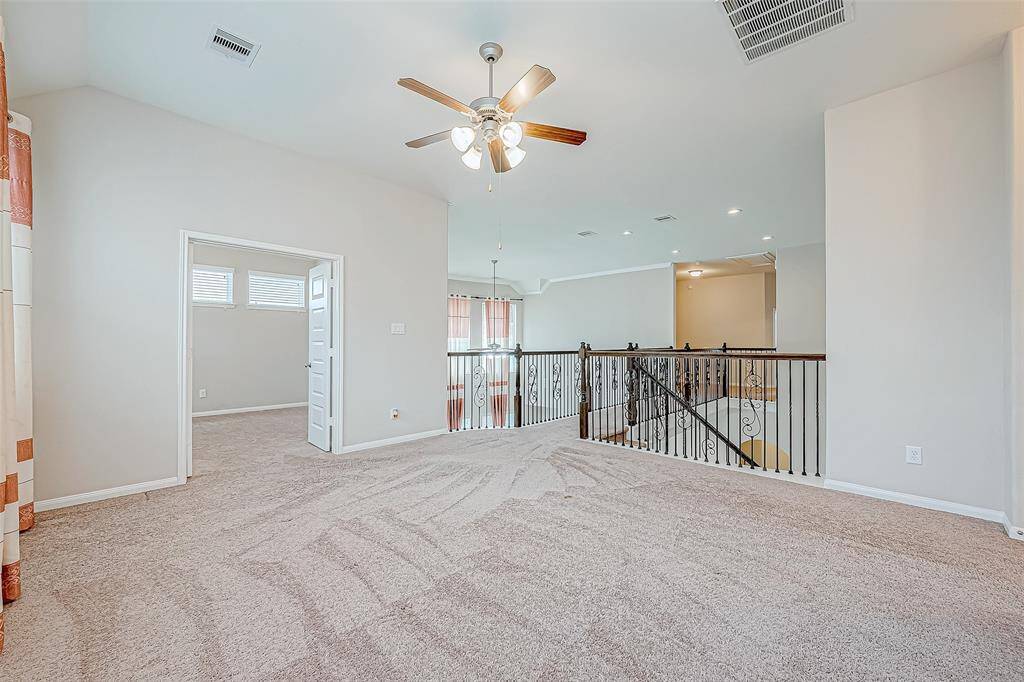 The common area or game room is a versatile space, perfect for family activities, entertaining guests, or relaxing. It offers plenty of room for games, a media center, or a cozy lounge area.