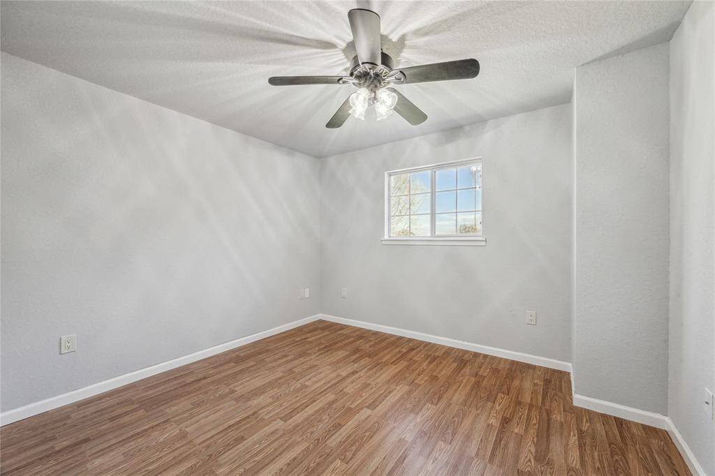 Another secondary upstairs bedroom.