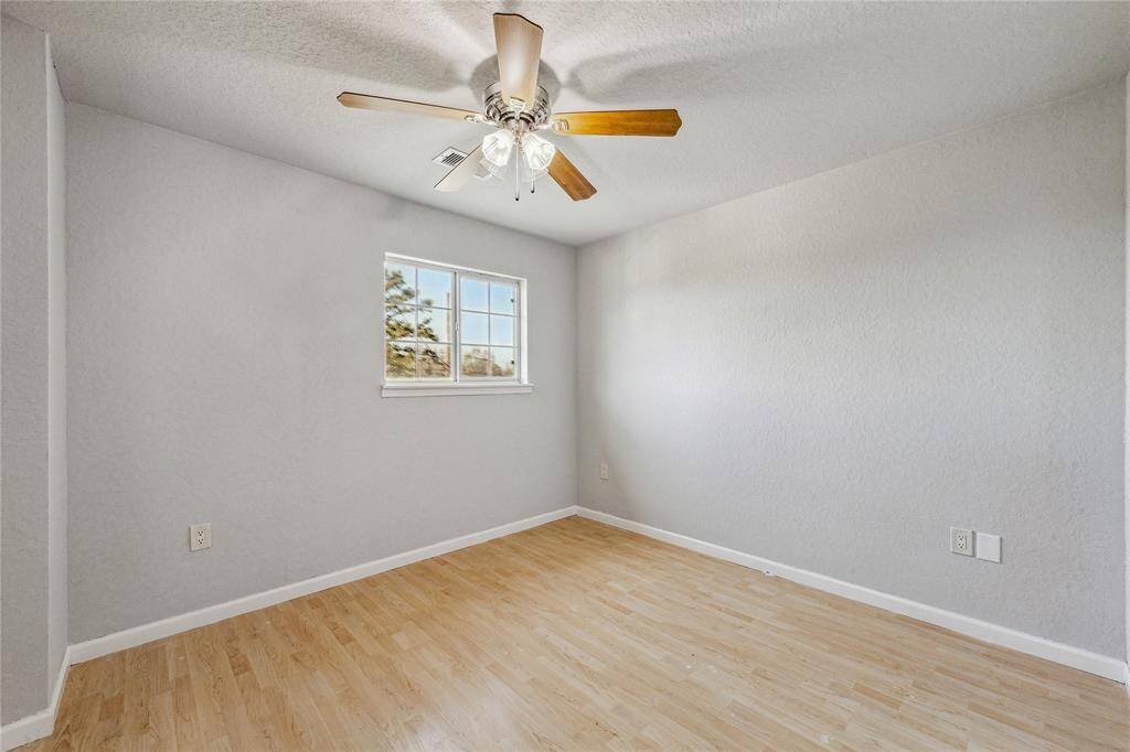 Another secondary upstairs bedroom.