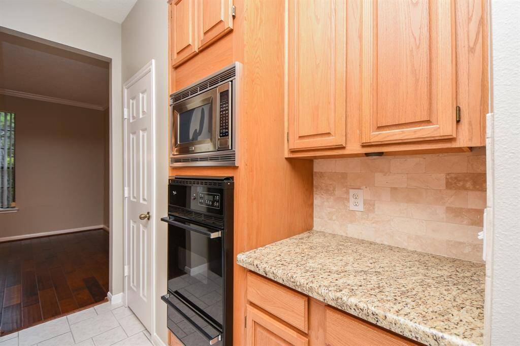 Store all your favorite kitchen gadgets in the many storage spaces available.