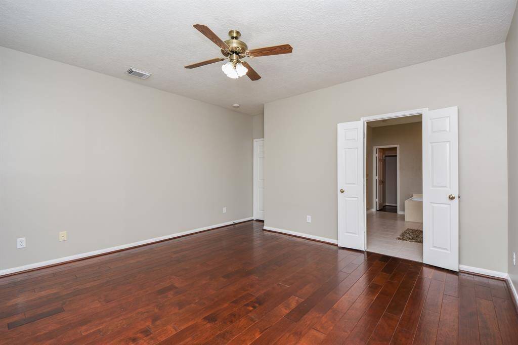 Relax after a long day in this private and spacious bedroom.