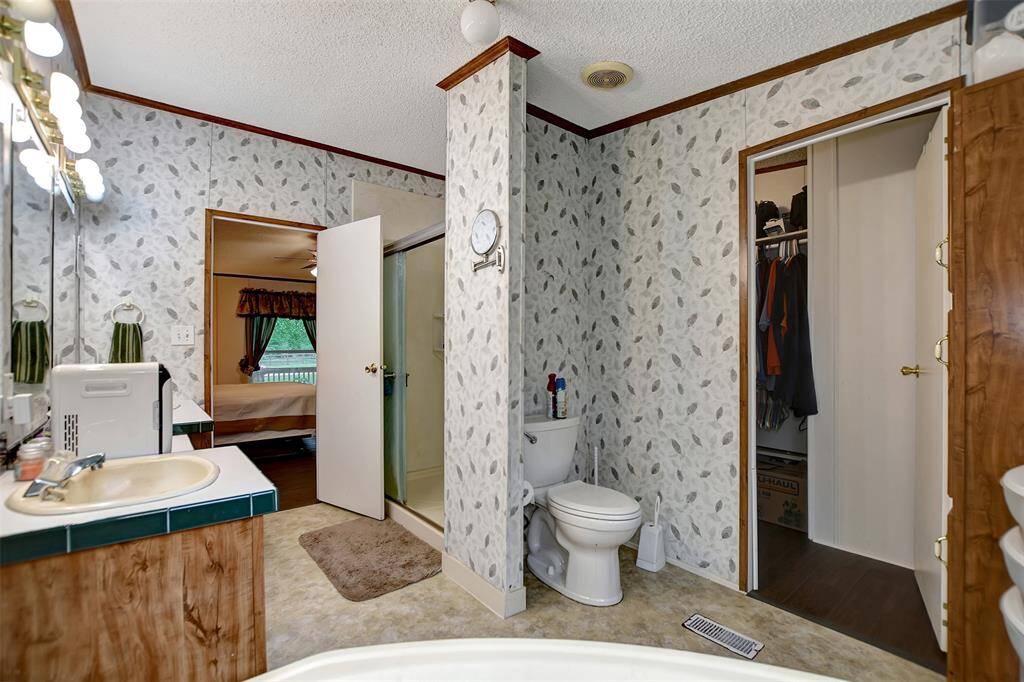 Primary bathroom with easy access to closet