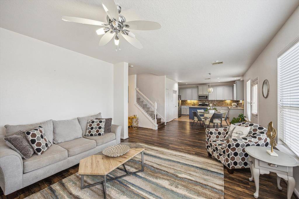 OPEN-CONCEPT LIVING/DINING AREA