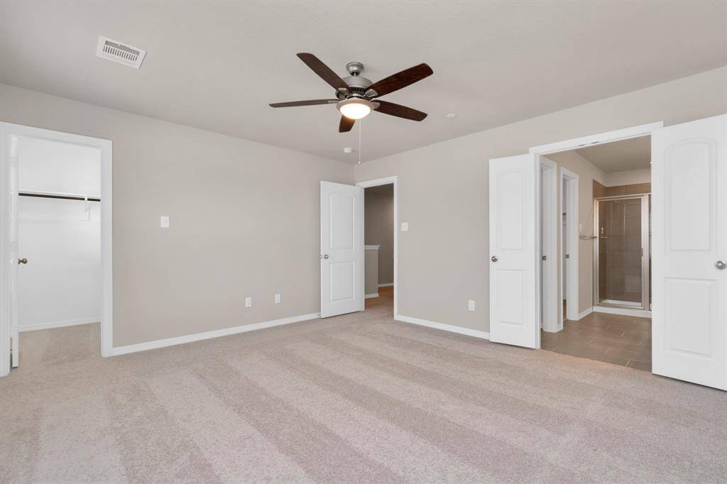 Primary Bedroom has TWO walk-in CLOSETS!