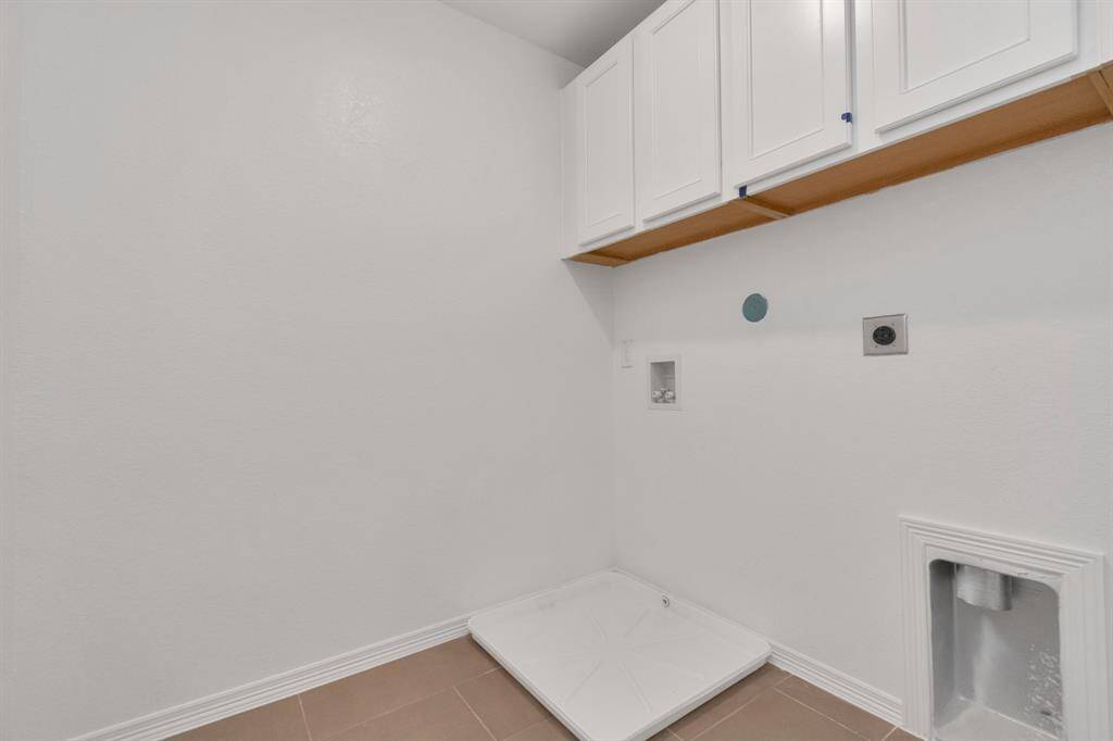 Utility room. Washer, dryer not included.