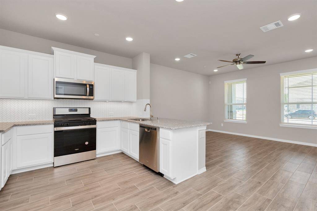 Brand new Stainless steel appliances.