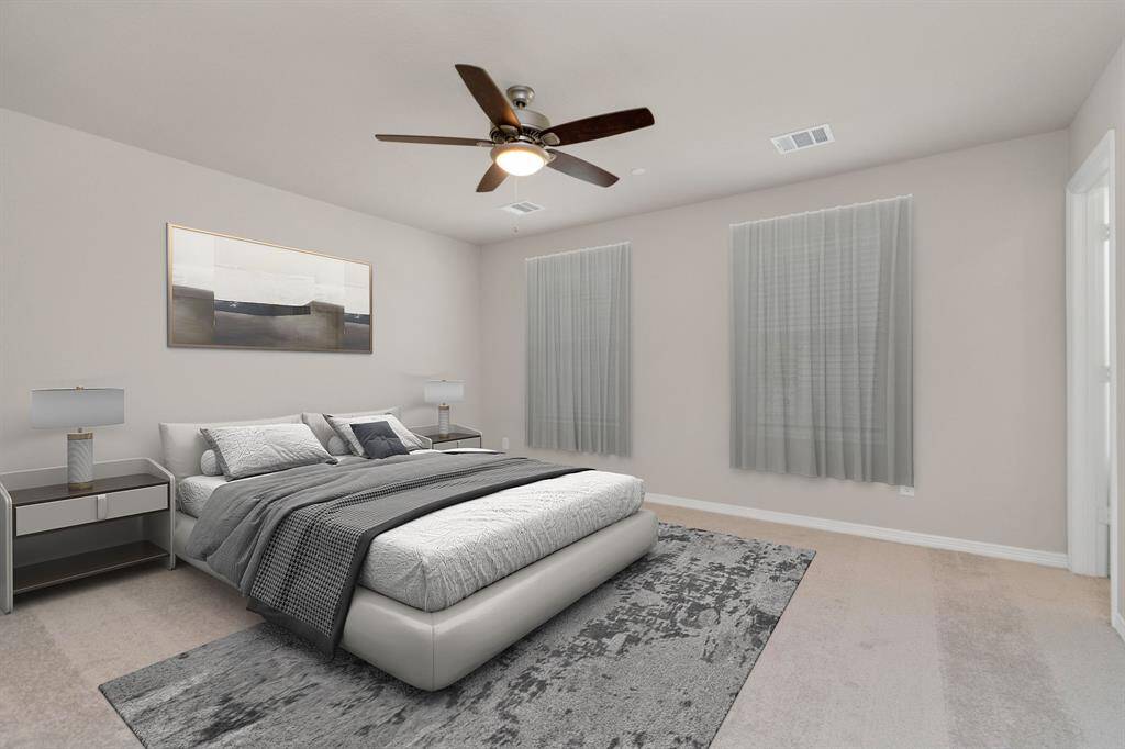 Staged photo of Primary Bedroom.