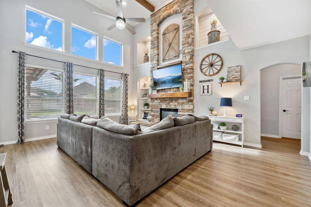 Kitchen looks into this living space. Notice the art niches detailed in shiplap - love this look!
