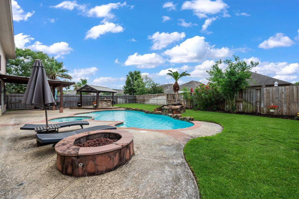 Complete with firepit for those fall evenings and notice the green space for pets!