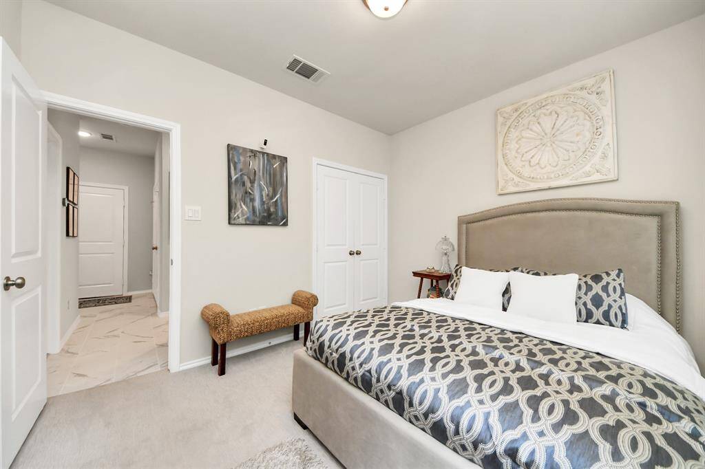 Exit to the bacjyard space from this bedroom on first level.