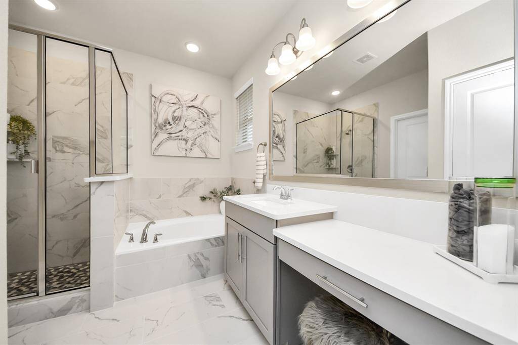 Primary bathroom with both tub and separate shower
