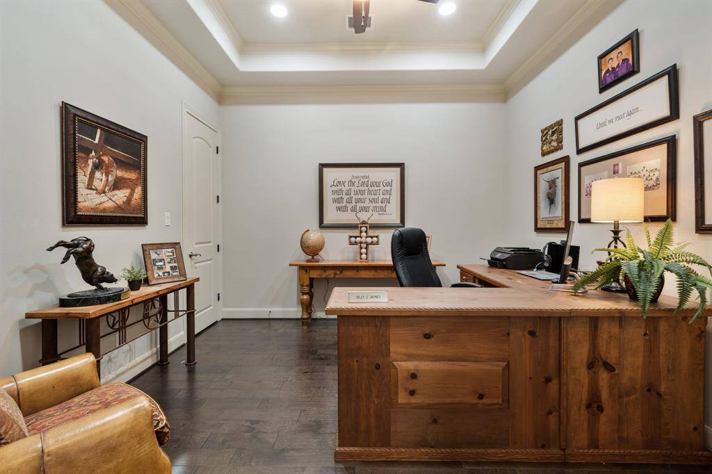 The home Study boasts engineered hard wood flooring, trey ceiling, crown molding, and a closet for additional storage. The space is large enough to accommodate a sizeable desk as well as cozy seating, TV, and/or additional furniture.