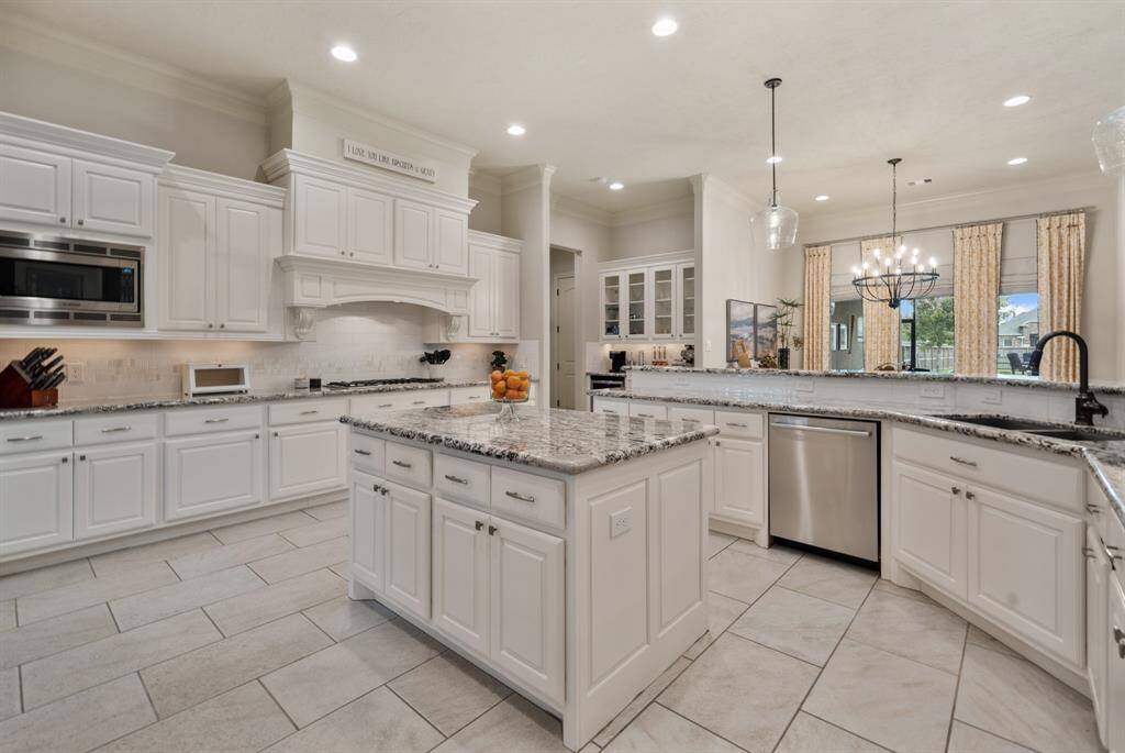 The Kitchen is gorgeous and the perfect blend of style and function that warrants it a feature in Southern Living Magazine. The home’s Bosch appliance package includes double ovens, a 5-burner gas cooktop, built-in microwave, and whisper quiet dishwasher.