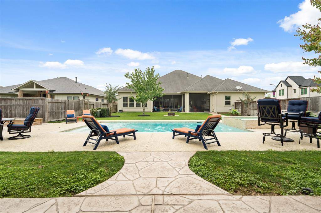 This Backyard is designed for entertaining groups both large and small! From splashing around, lounging poolside, or dining al fresco, it can all be enjoyed in the comfort of this double lot Backyard.