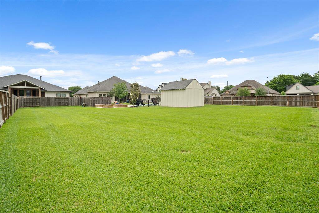 Even with a Pool, Spa, Fire Pit, Cabana, and Garden Beds, there is still plenty of room for dogs to run and kids to play. The entire yard is equipped with a sprinkler system, making it easy to keep it lush and green all year long. This double lot offers up a lot of opportunities and increases privacy.