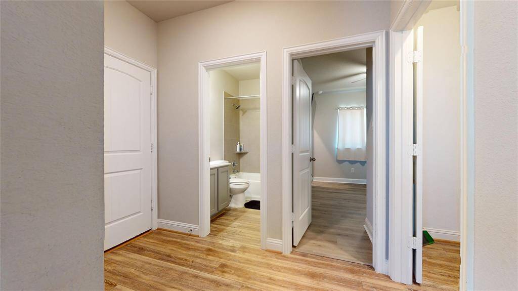 Convenient first-floor layout featuring a mudroom, bathroom, laundry, and guest bedroom.