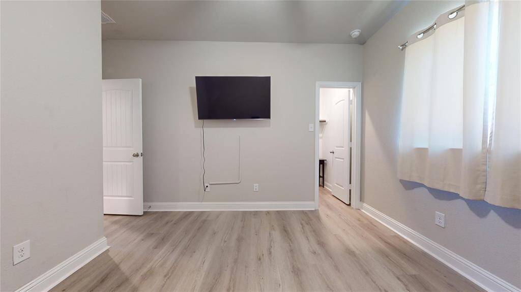 Cozy first-floor guest bedroom for convenience and privacy.