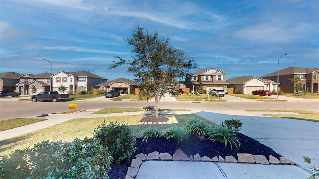 Charming porch with inviting front view, perfect for relaxation.