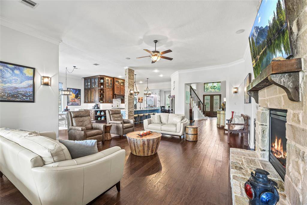 The expansive open-concept design offers a seamless flow between living spaces, perfectly suited for both entertaining and effortless everyday living, embodying modern luxury and comfort.