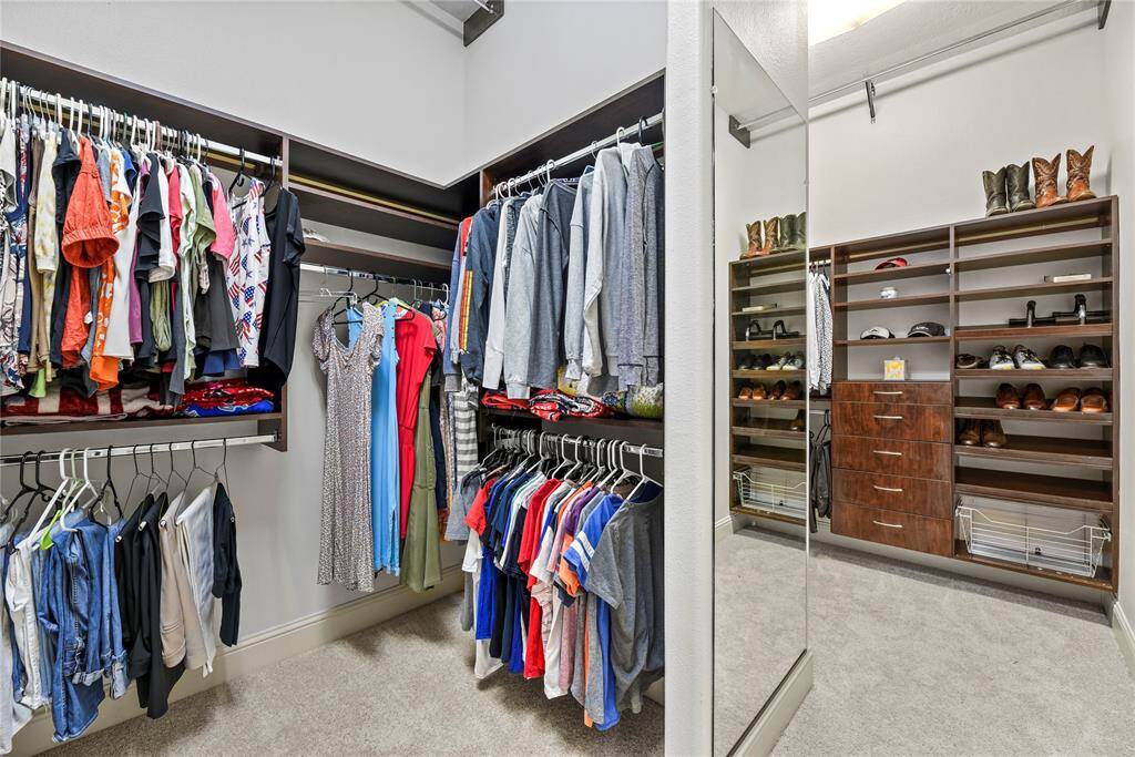 The primary closet provides generous space to store your entire wardrobe while keeping everything neatly organized and easily accessible.