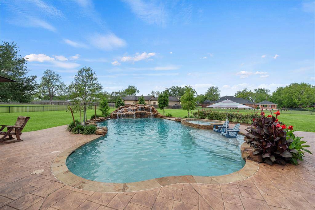 How flawlessly designed is this pool and spa? An exquisite oasis that blends stunning aesthetics with unparalleled relaxation, offering a serene escape where luxury meets tranquility.