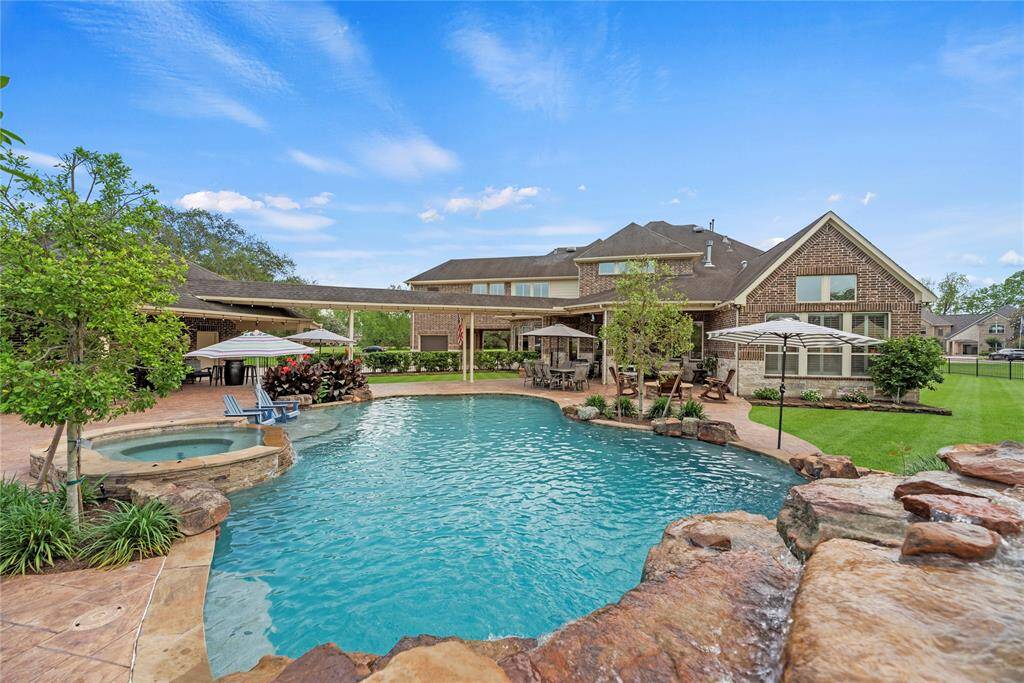Life is better poolside—this luxurious backyard retreat offers something for everyone, providing the perfect setting for family fun, relaxation, and unforgettable memories under the sun.