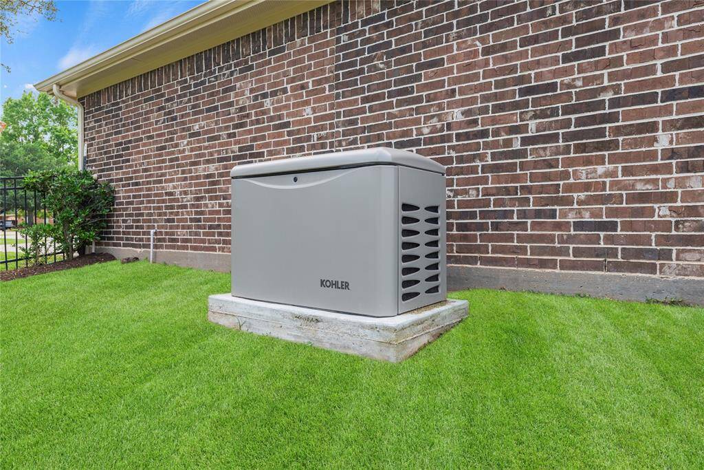 A top-of-the-line Kohler whole-house generator ensures uninterrupted comfort and peace of mind, delivering reliable, automatic backup power to keep the entire home running smoothly no matter the conditions.