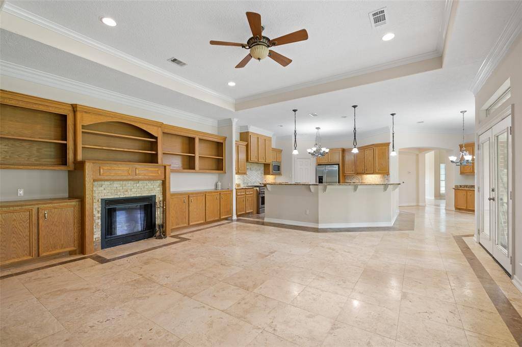 Another view of this large family room conveniently situated off the kitchen.