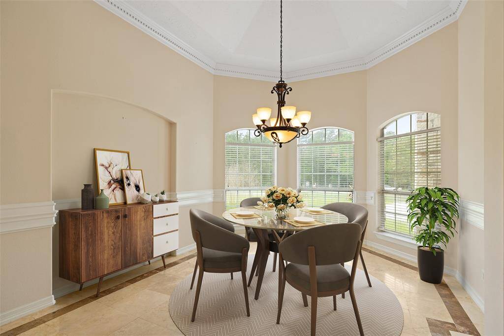 This formal dining room is digitally staged to give an idea of what you can do with your dining furniture.