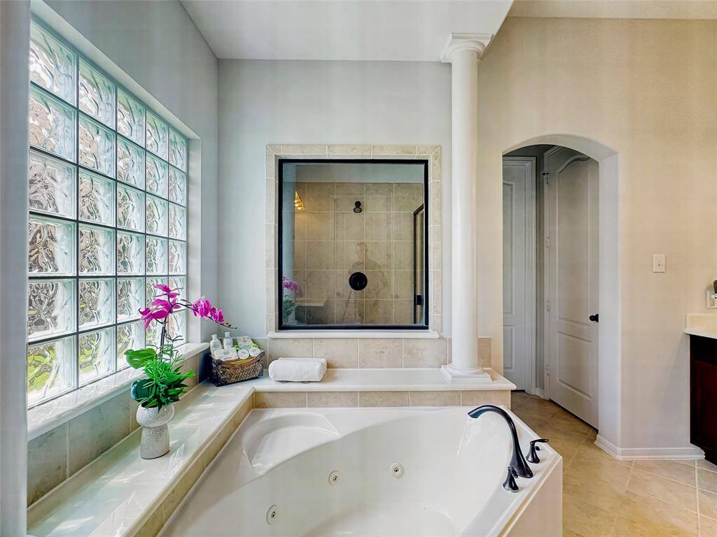 Master Bathroom with window to shower!