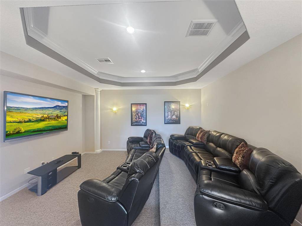 Unwind with your favorite movie in this 2 tier, oversized Media Room!