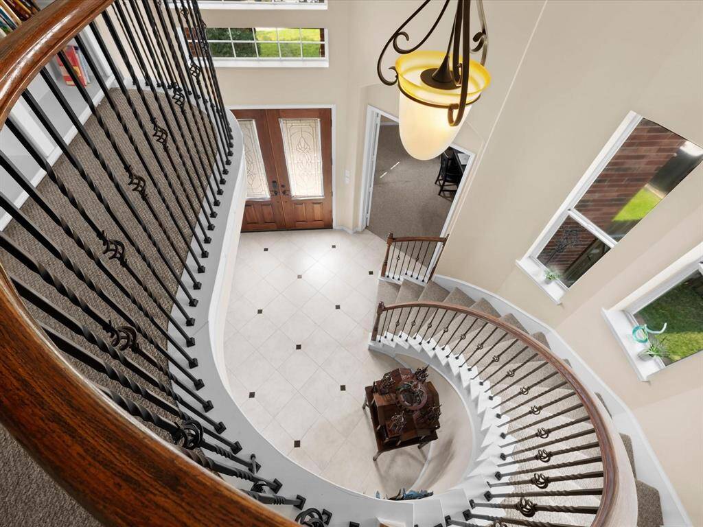 Beautiful Grand foyer with staircase.