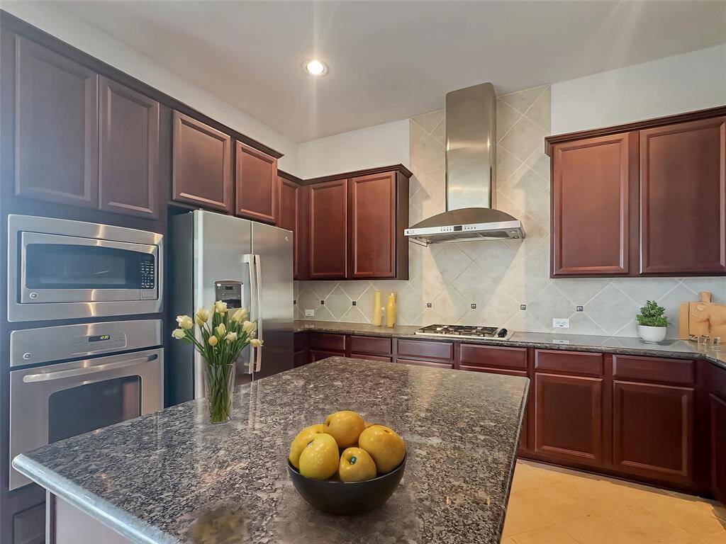 Chiefs Dream Kitchen with granite counters and large island!