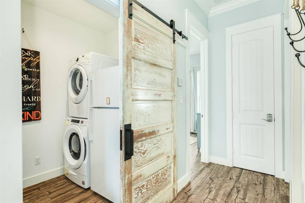 3810 Abalone host history with this 1900's sliding barn door leading into the utility room.