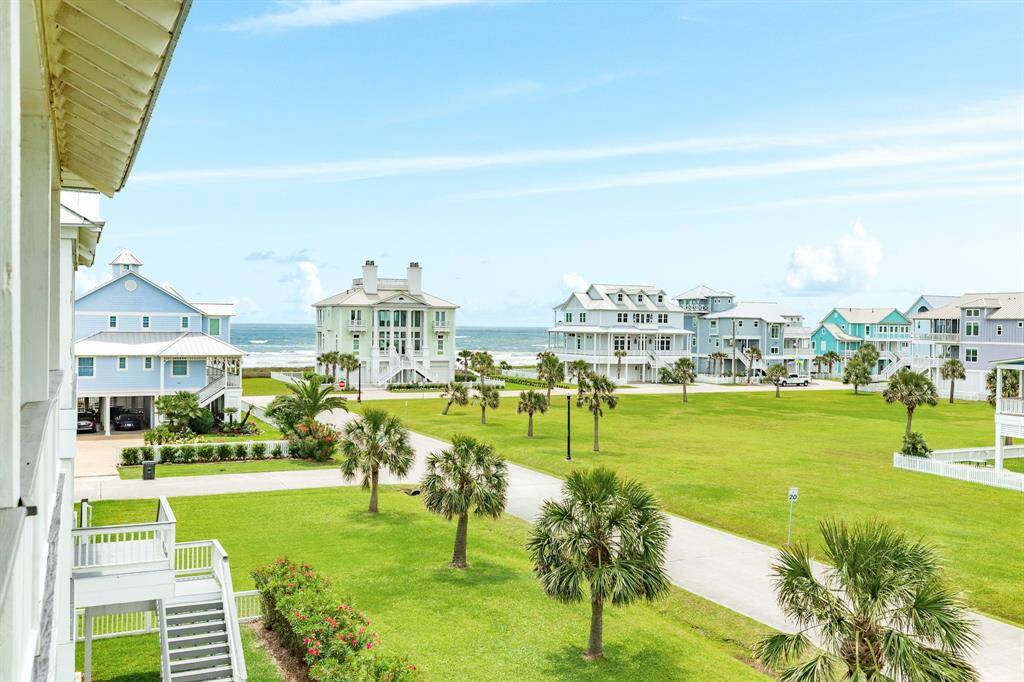 Beachside Village is a picturesque coastal neighborhood with charming, colorful homes and manicured lawns, offering a serene ocean view. Ideal for buyers seeking a tranquil beachfront lifestyle.