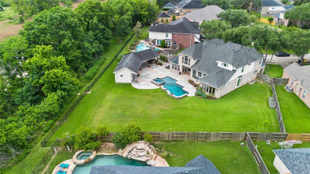 Over 20,000sqft of land for you to enjoy. House has never flooded.