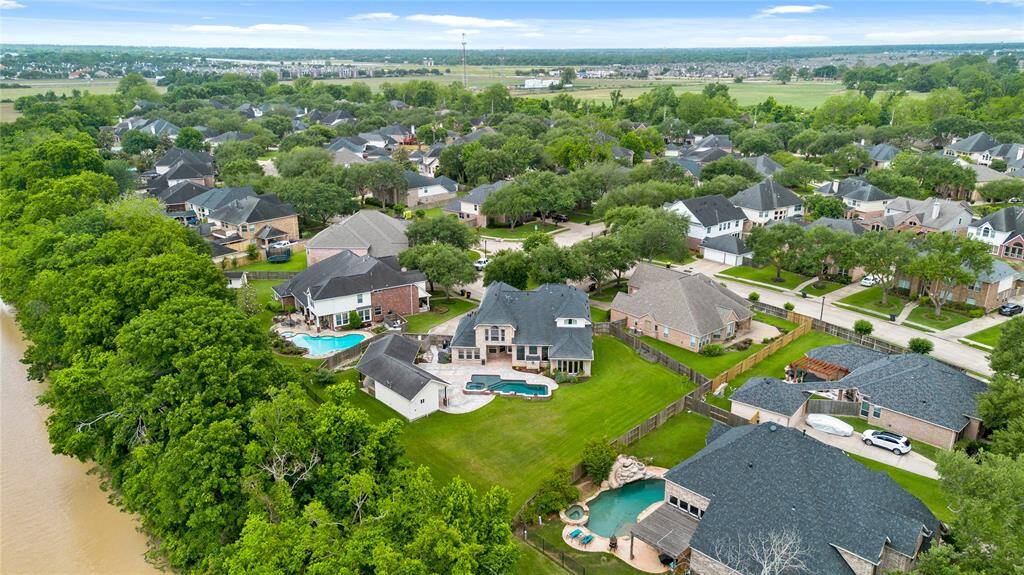 Over 20,000sqft of land for you to enjoy. House has never flooded.