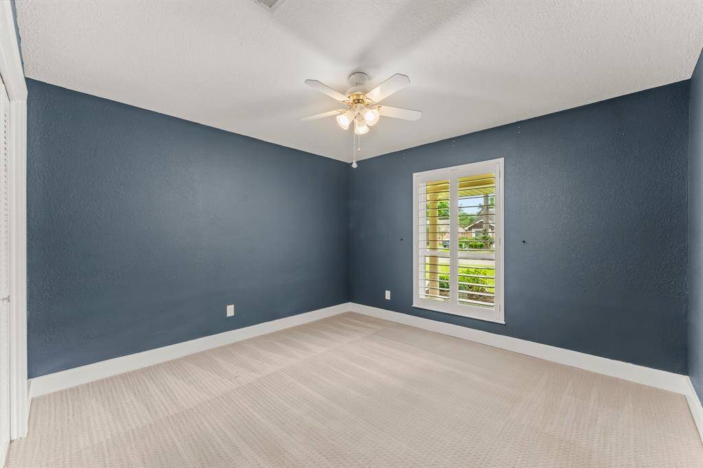 Fourth Bedroom with shutters and accent paint!