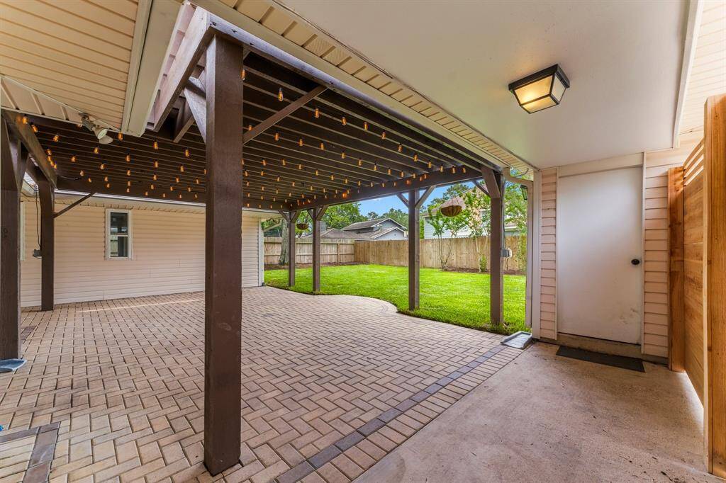 Step on to your back patio with beautiful pergola! Lots of space for back yard barbecues!