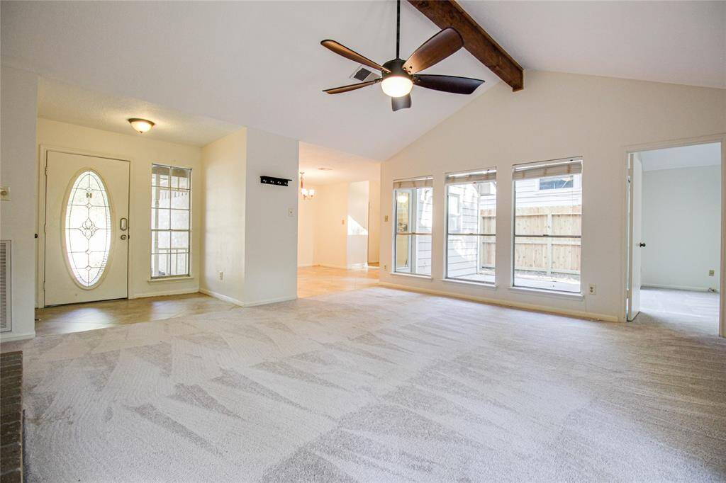Living room has plenty of natural light.