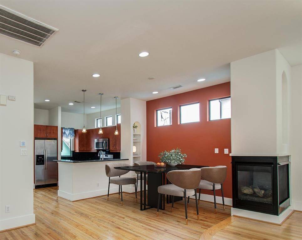 There's a separate Dining Room space.  Virtually staged.