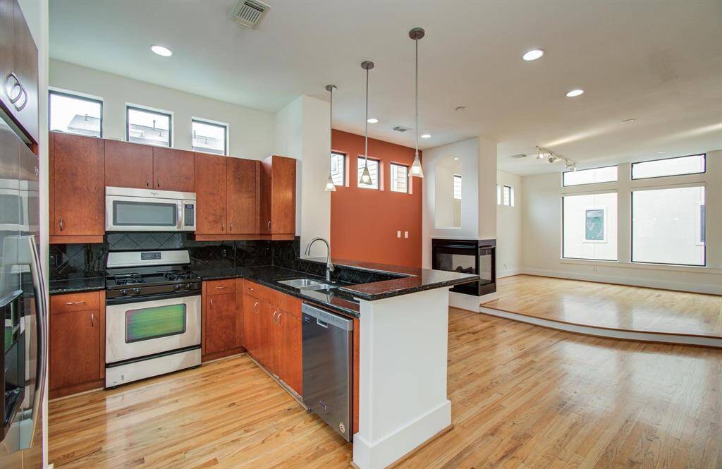 Kitchen opens to the living room.