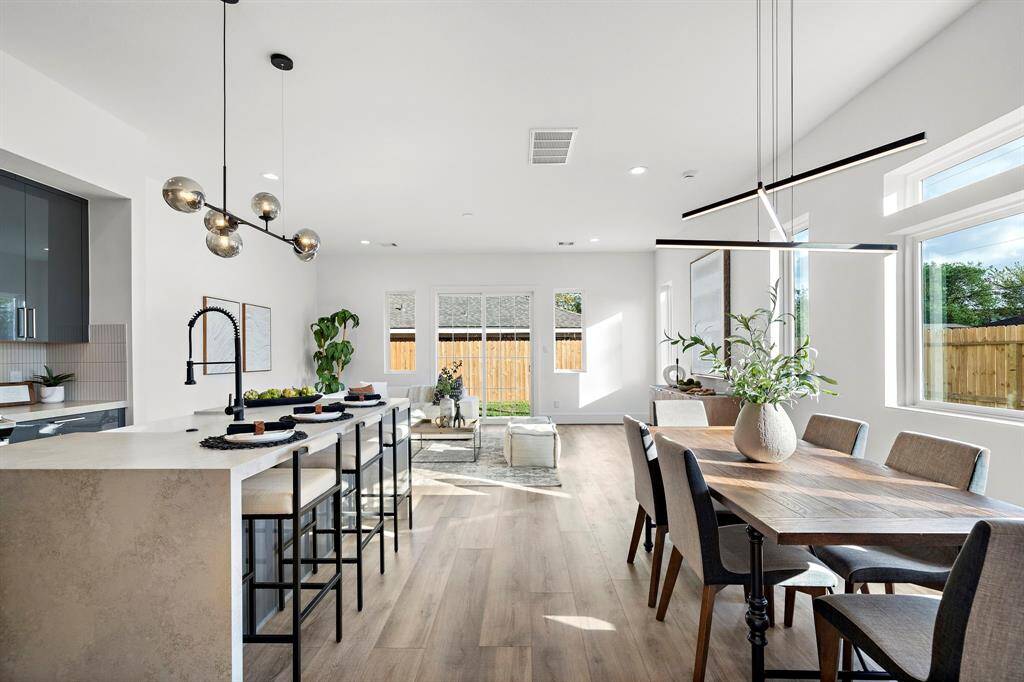Enjoy the luxury of soaring 10-foot ceilings on both the first and second levels, creating an open and expansive atmosphere throughout the home.