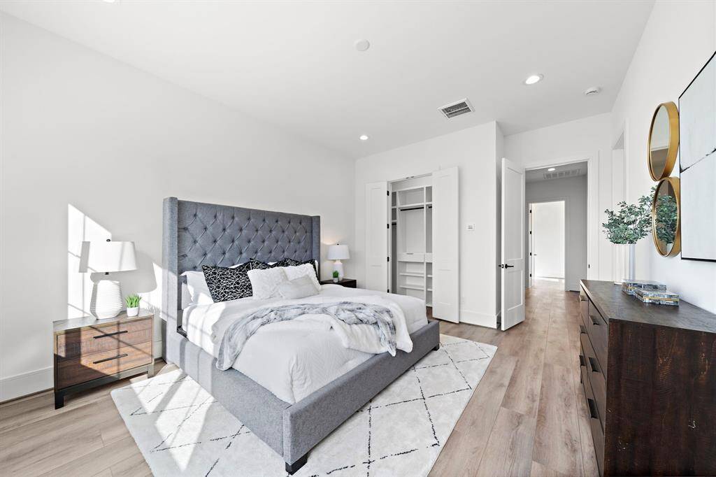 The well-designed split floor plan provides ideal separation between the primary suite and the additional secondary guest bedrooms, offering privacy and functionality for everyone.