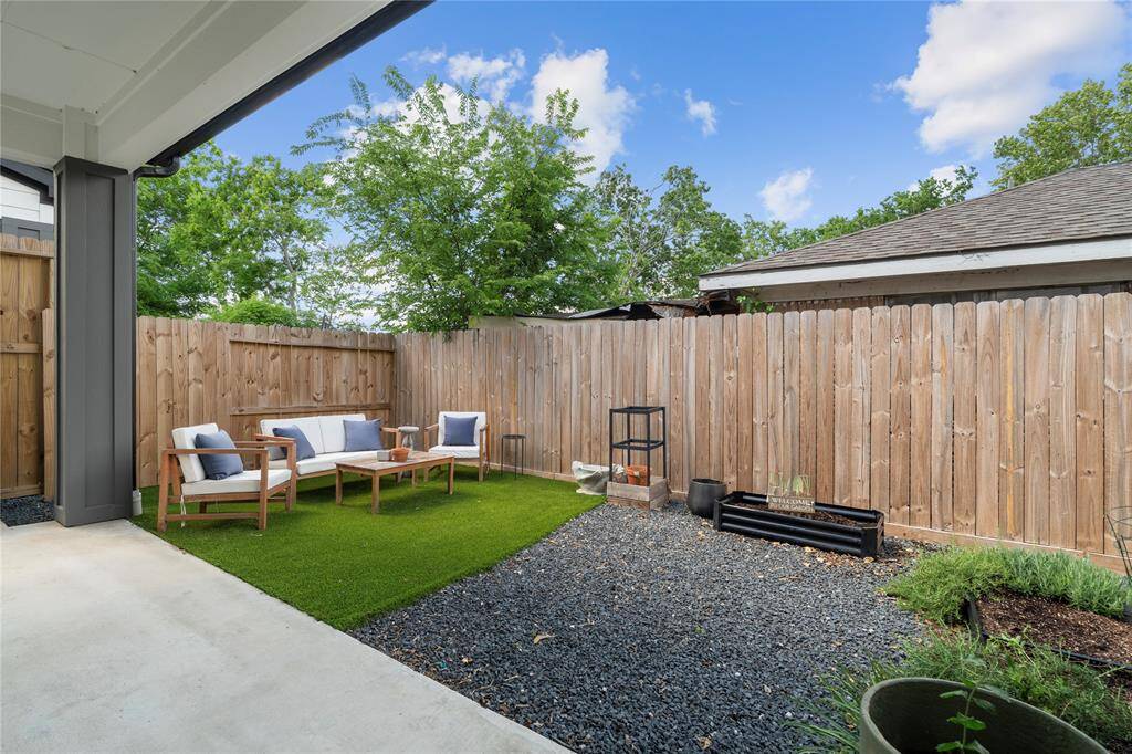 The outdoor space is equipped with artificial turf, making maintenance a breeze. Schedule your private tour today.