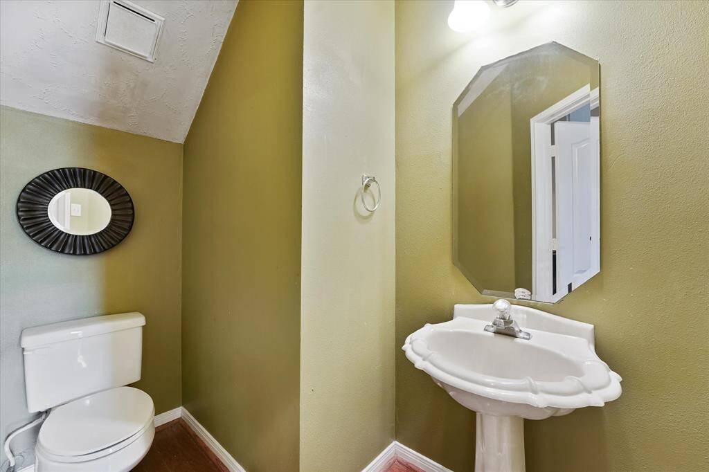 Half bath off the foyer.