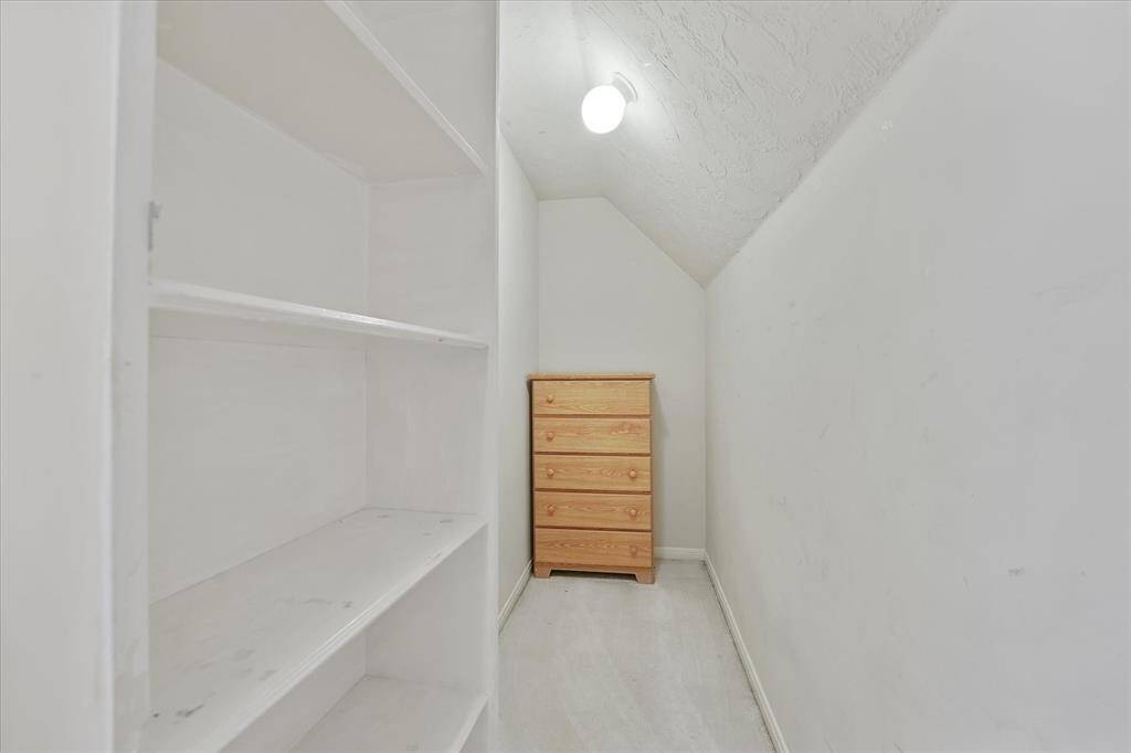 The bedroom has a secret closet behind the bookshelf!