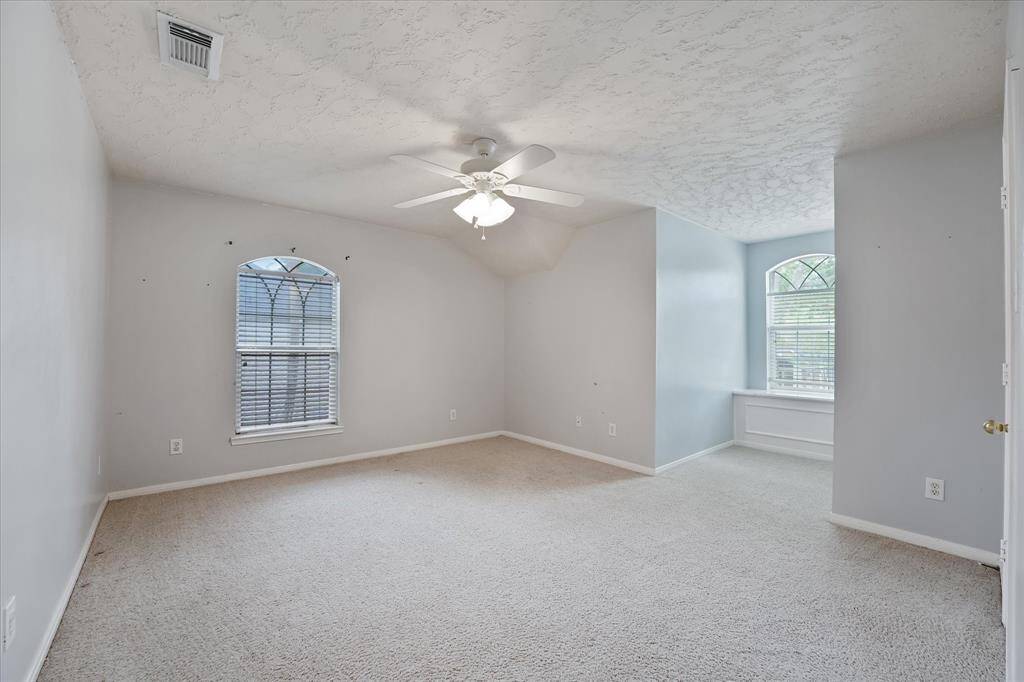 Bedroom 4 has the cutest bench-seat by the window.