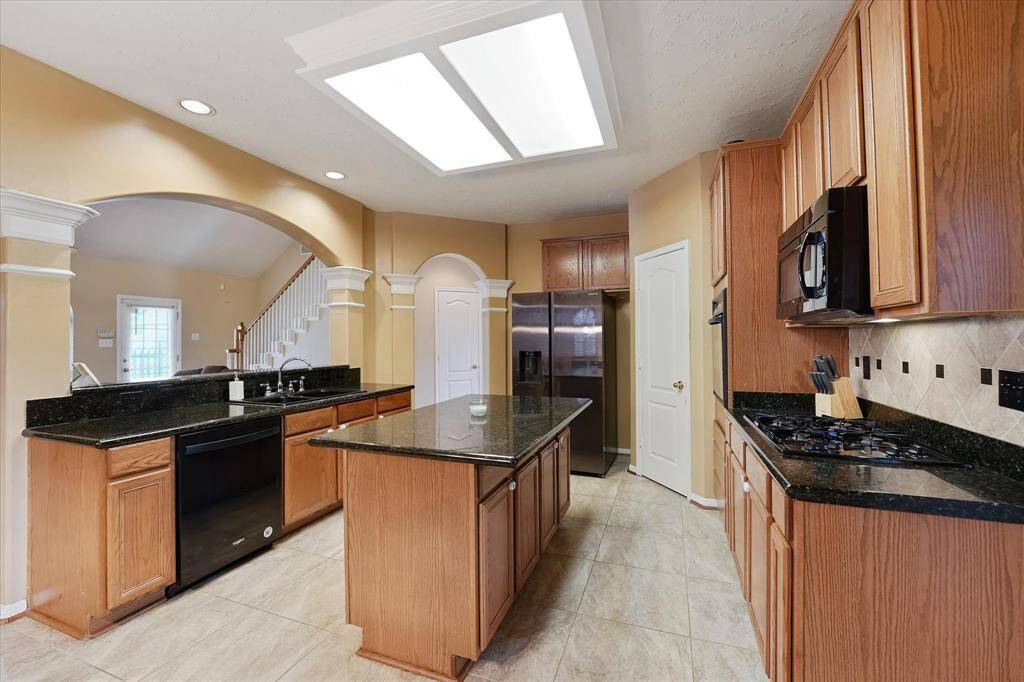 The kitchen also has a very functional layout.